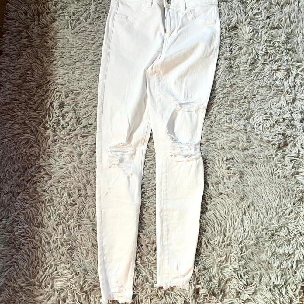 American Eagle white minimalist gritty coquette punk raw distressed skinny jeans